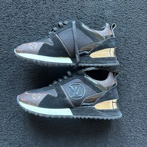 Louis Vuitton Men's Sneakers in Black and Gold